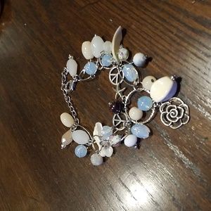 Fun Silvertone Multisize Link  Bracelet With Beads, Dangles, Shell, Peace Signs.